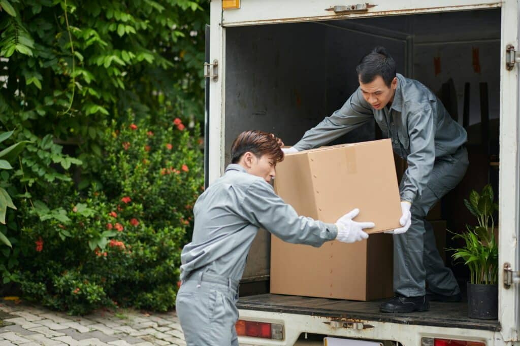 Movers LoadingBoxes in Van